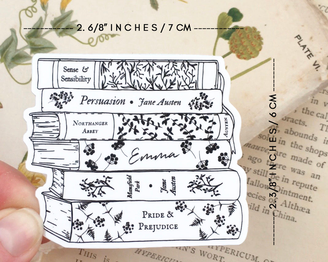 Image of a die cut sticker of a book stack of Jane Austen's most famous works in black line art - with dimensions around. 7 by 6 centimetres.